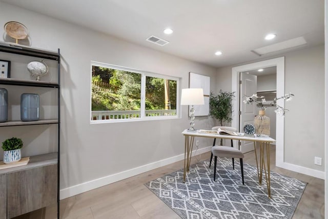 office area with hardwood / wood-style floors