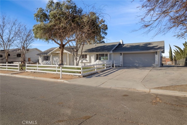 ranch-style house featuring a garage