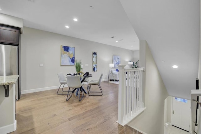 dining room with light wood-type flooring