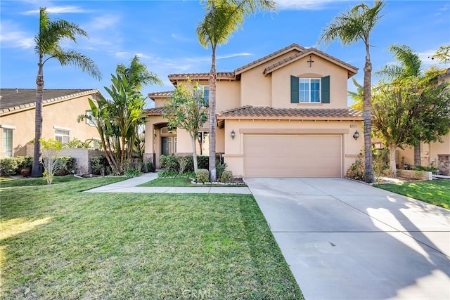 view of front of property with a front lawn and a garage