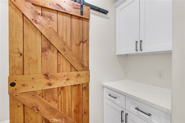 interior details with a barn door