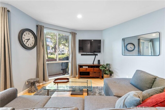 living room with wood-type flooring