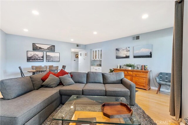 living room featuring light wood-type flooring