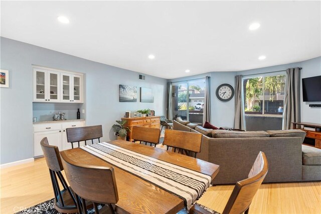 dining room featuring light hardwood / wood-style floors