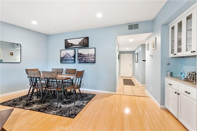 dining area featuring light hardwood / wood-style flooring