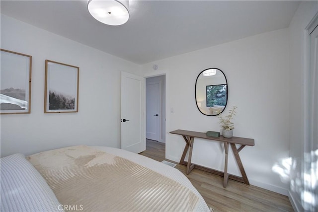 bedroom featuring light hardwood / wood-style flooring