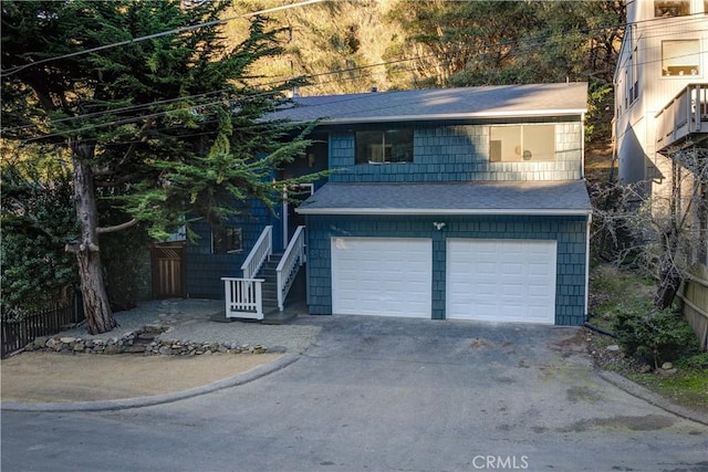 view of front of property featuring a garage