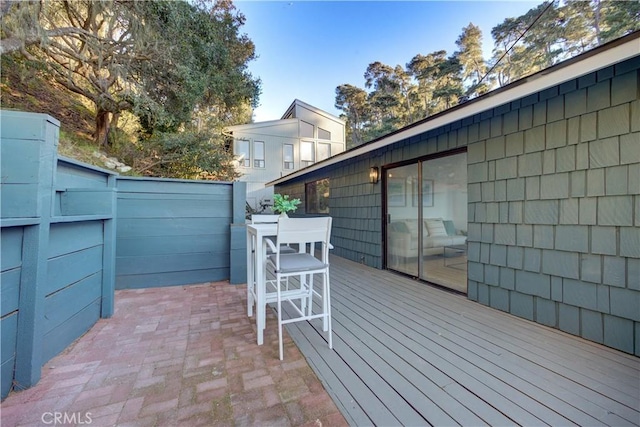 view of patio / terrace with fence and a deck