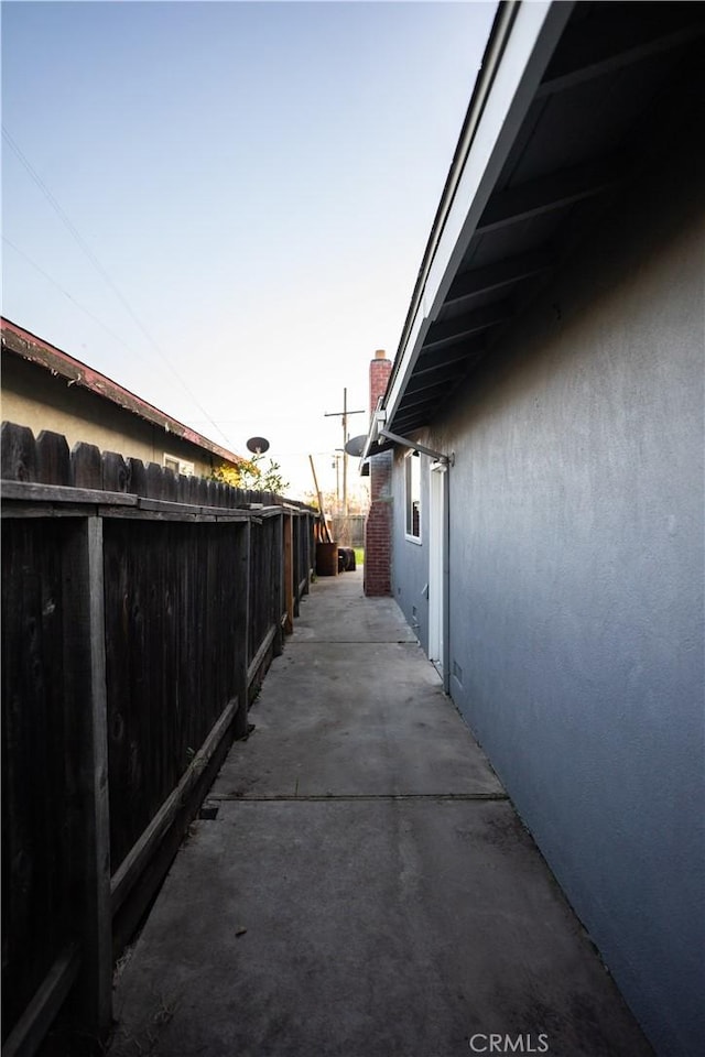 view of property exterior at dusk