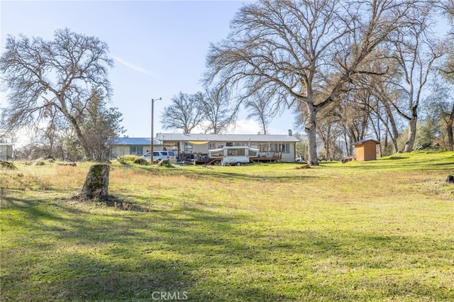 view of yard with a deck