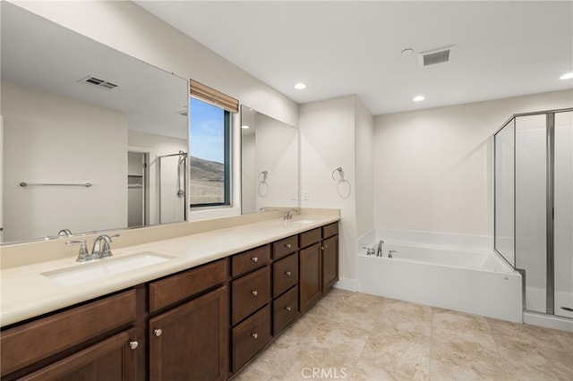 bathroom featuring vanity and plus walk in shower