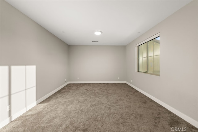 spare room with carpet flooring