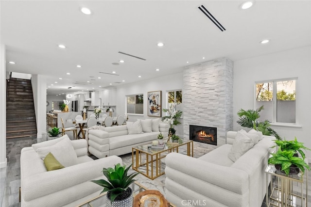 5157 Avenida Oriente, Tarzana, CA 91356 - living area featuring recessed lighting, stairway, and a fireplace