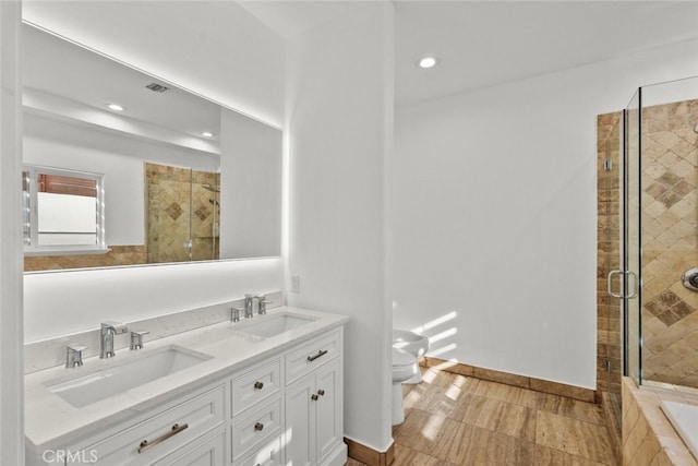 5157 Avenida Oriente, Tarzana, CA 91356 - full bathroom with double vanity, toilet, a shower stall, recessed lighting, and tiled tub