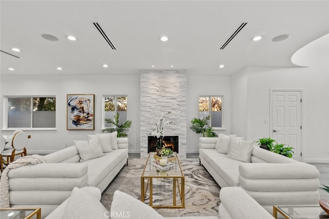5157 Avenida Oriente, Tarzana, CA 91356 - living area featuring recessed lighting, baseboards, and a stone fireplace
