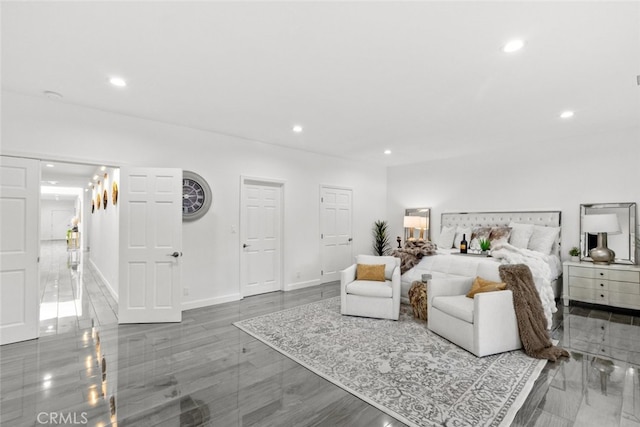 bedroom featuring recessed lighting and baseboards