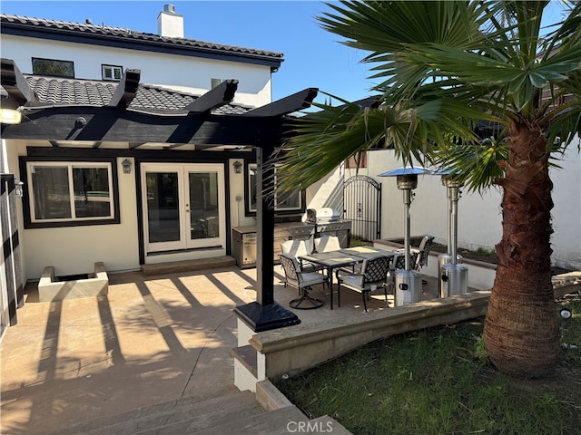 5157 Avenida Oriente, Tarzana, CA 91356 - wooden terrace featuring french doors, a pergola, a patio area, and outdoor dining area