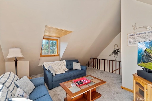 living room with lofted ceiling and light carpet