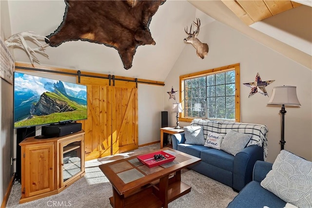 carpeted living room featuring vaulted ceiling and a barn door