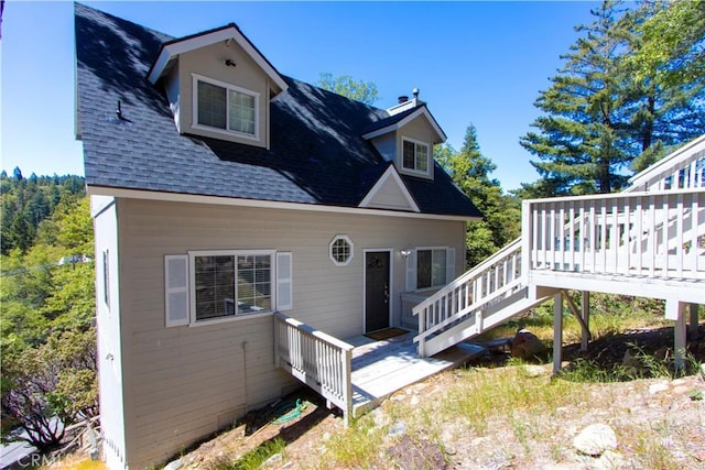 exterior space featuring a wooden deck