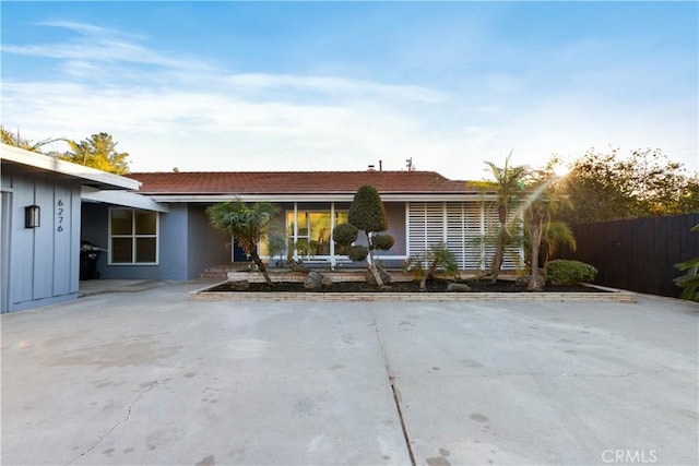 rear view of property featuring a patio