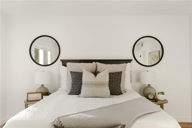 bedroom featuring wood-type flooring