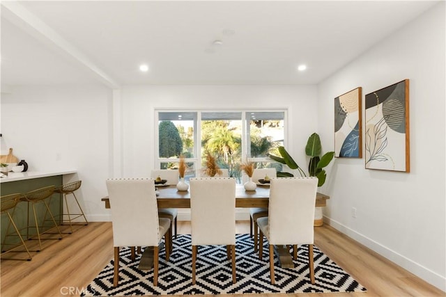 dining area with light wood-type flooring