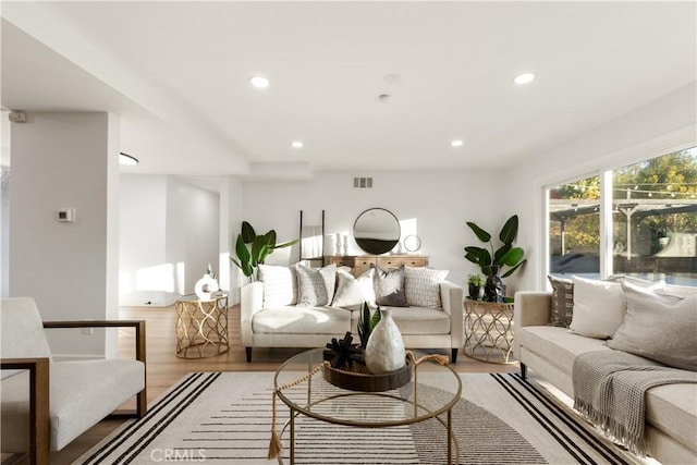 living room with light hardwood / wood-style floors