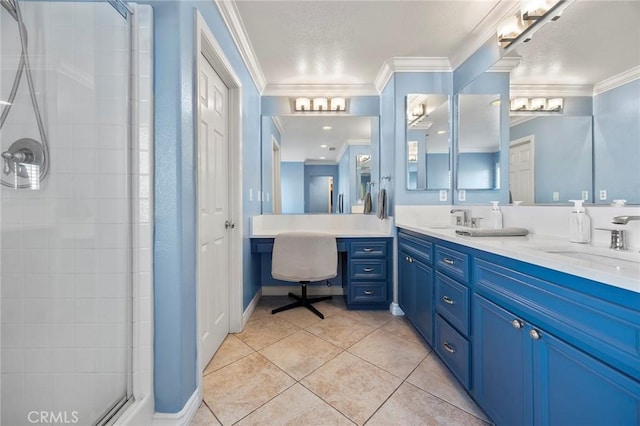 bathroom with tile patterned floors, vanity, a shower with shower door, and crown molding