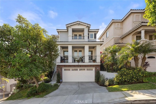 view of front of property with a balcony and a garage