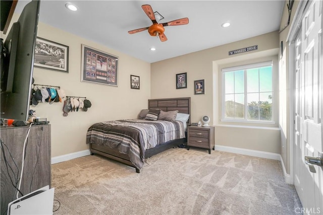 carpeted bedroom with recessed lighting, a ceiling fan, and baseboards