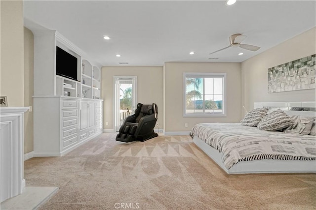 carpeted bedroom featuring baseboards, recessed lighting, and multiple windows