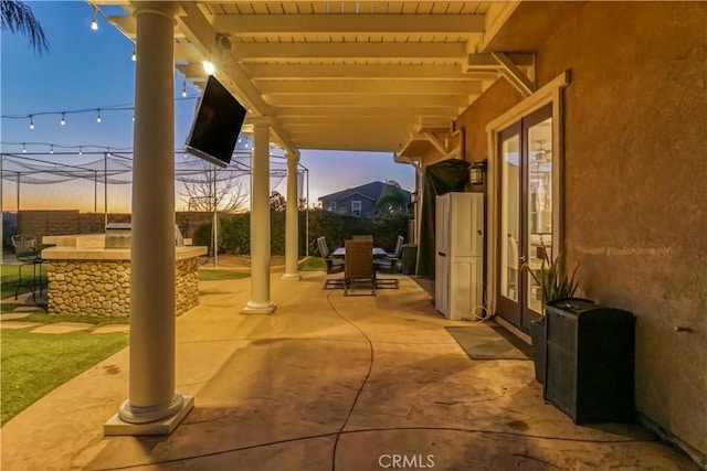 view of patio with an outdoor kitchen