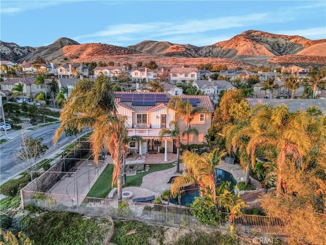 bird's eye view featuring a mountain view and a residential view