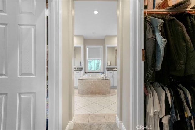 interior space with light tile patterned floors