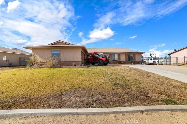 single story home with a front yard