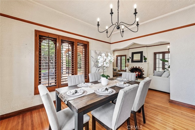 dining room featuring a chandelier and hardwood / wood-style floors