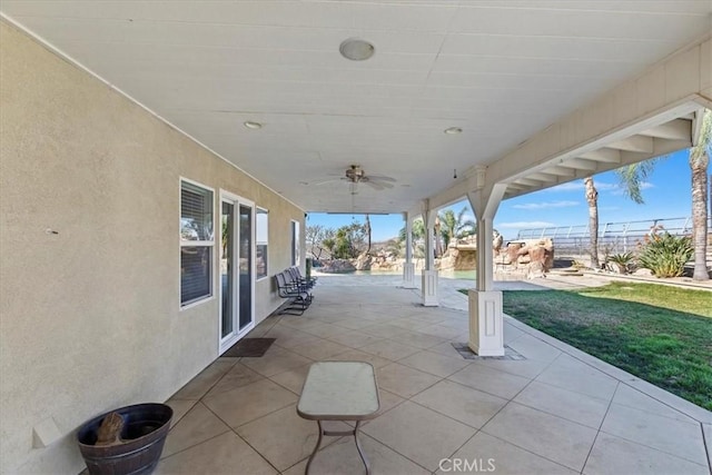 view of patio with ceiling fan