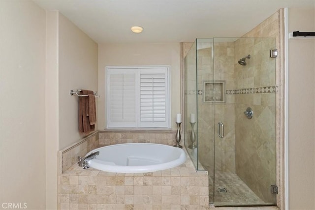 bathroom featuring plus walk in shower