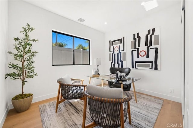 sitting room with light hardwood / wood-style floors