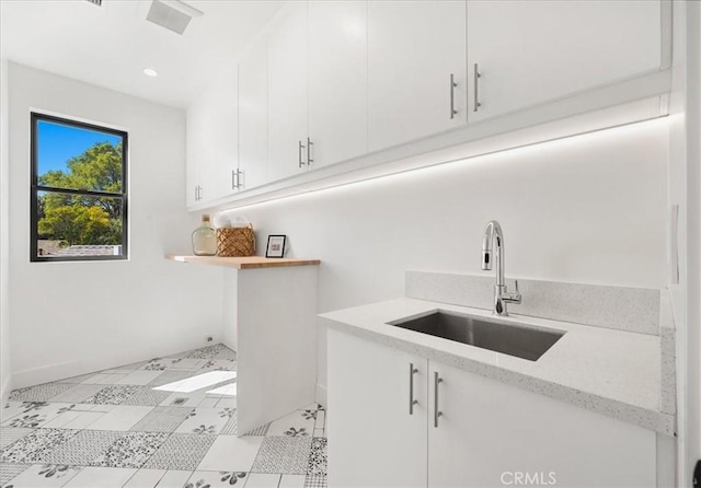 laundry area with sink