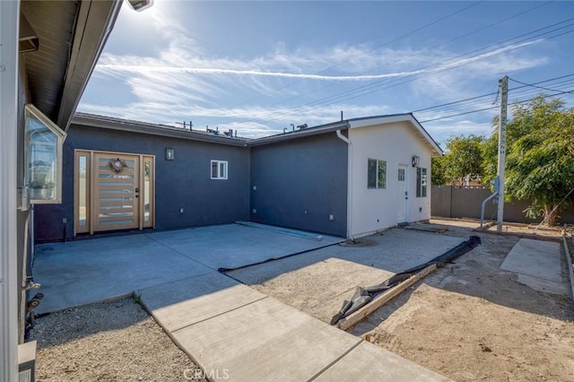 back of house featuring a patio area