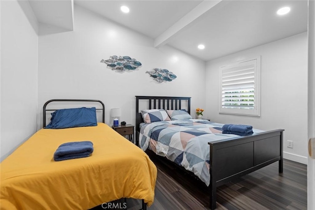 bedroom featuring beam ceiling and dark wood-type flooring