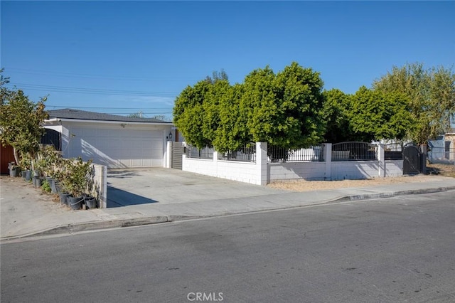 obstructed view of property featuring a garage