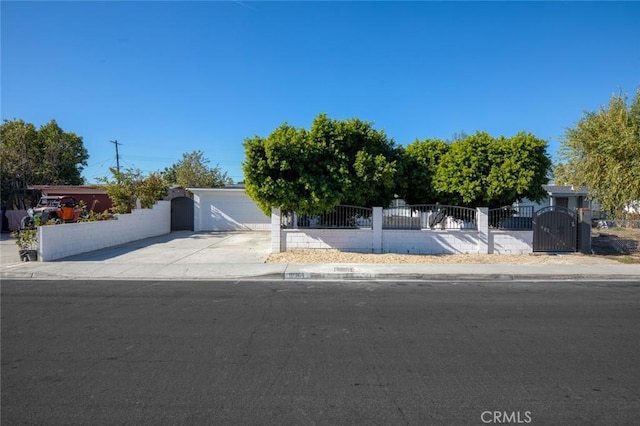 obstructed view of property featuring a garage