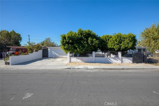 obstructed view of property with a garage