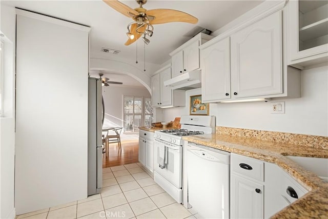 kitchen featuring white cabinetry, ceiling fan, white appliances, light tile patterned flooring, and light stone countertops