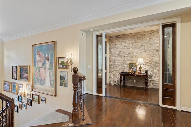 hallway featuring dark hardwood / wood-style flooring and ornamental molding