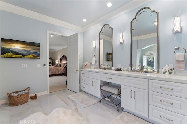 bathroom with vanity and crown molding