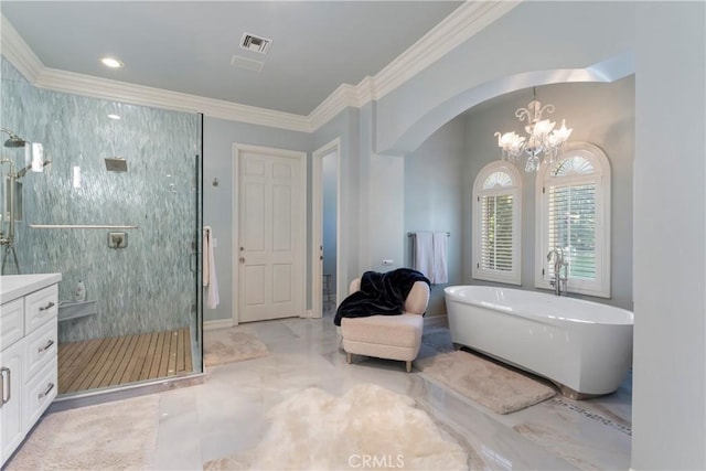 bathroom with vanity, an inviting chandelier, separate shower and tub, and ornamental molding